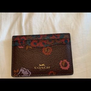 Coach poppy print card holder. Like new.